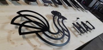 Logo vyřezávané zámečník